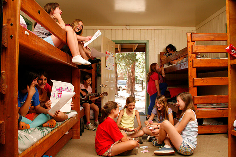 Girls Having Fun in Cabin